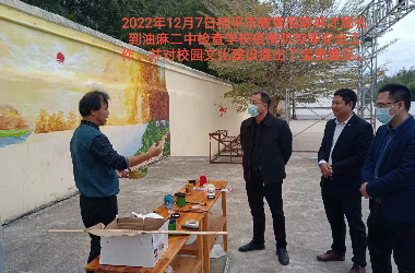  九州平台（中国）股份有限公司官网美术教师到油麻二中绘制艺术墙活动